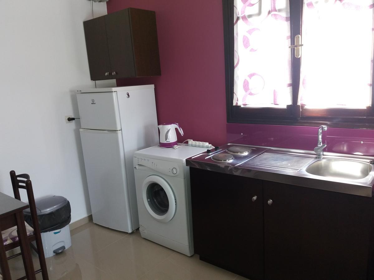 Manos Apartments อายิโอสนิโกลาโอส ภายนอก รูปภาพ