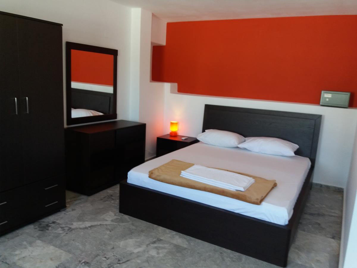 Manos Apartments อายิโอสนิโกลาโอส ภายนอก รูปภาพ