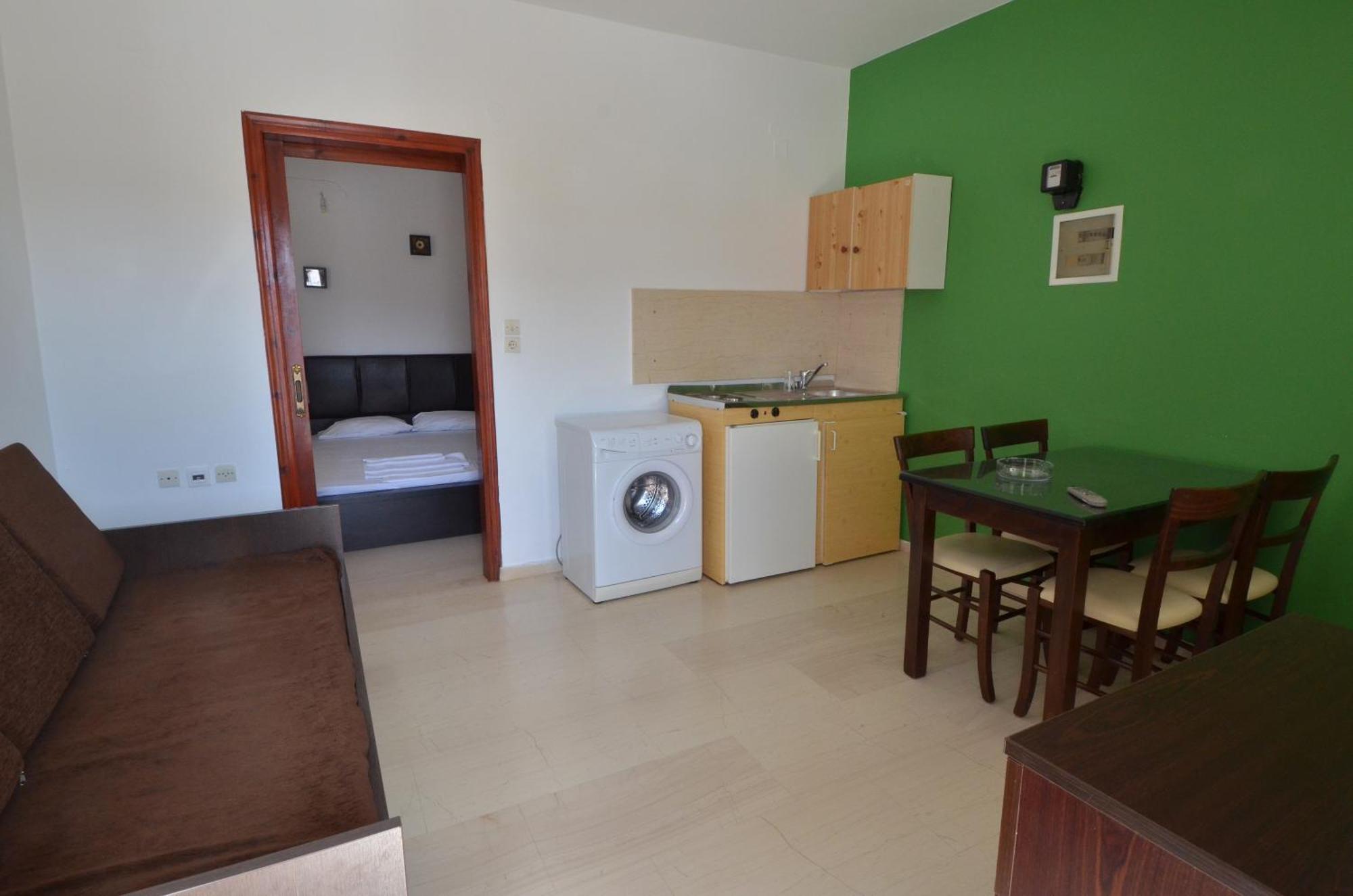 Manos Apartments อายิโอสนิโกลาโอส ภายนอก รูปภาพ
